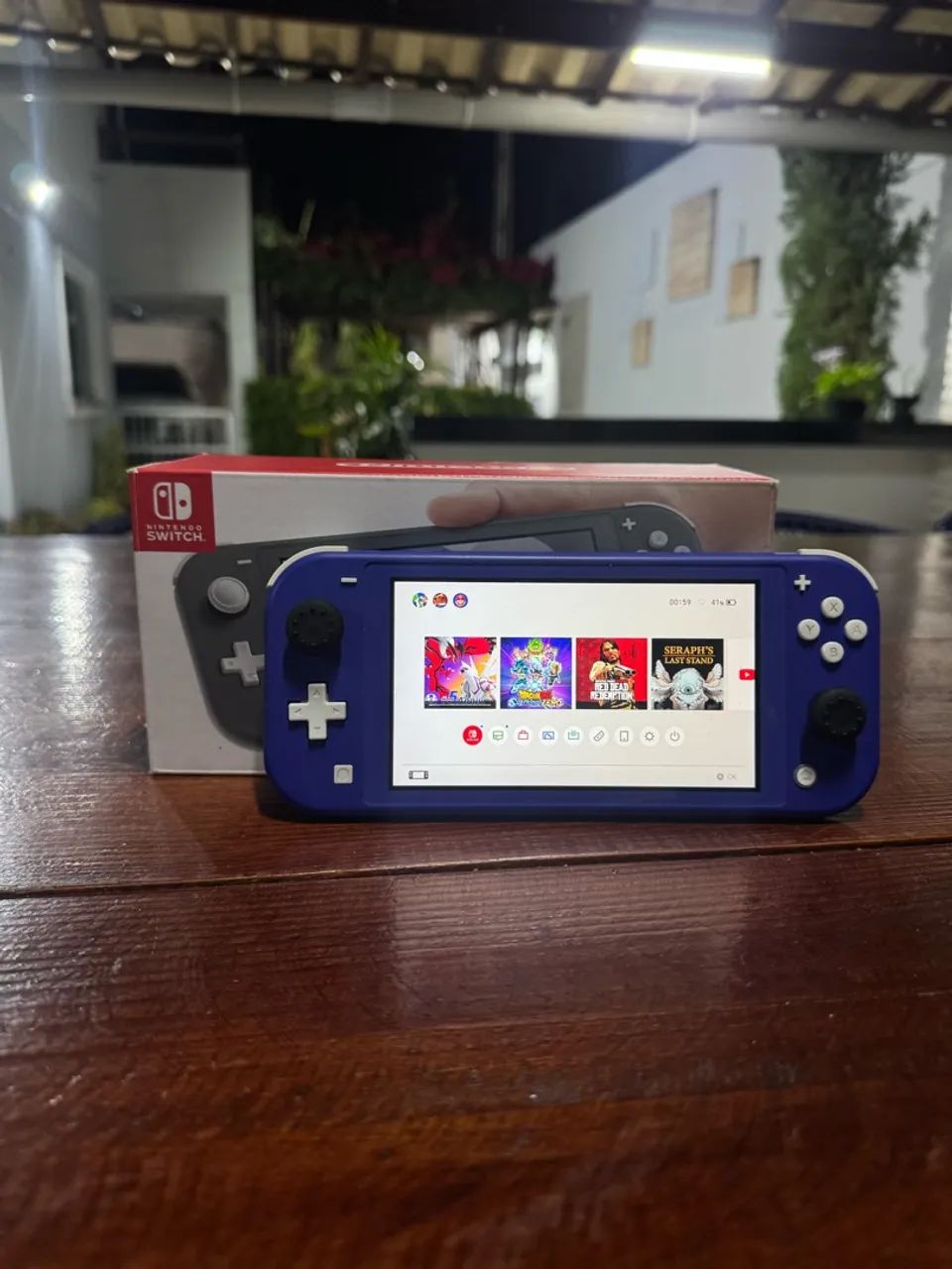 Nintendo Switch Lite com Jogos - Foto 2