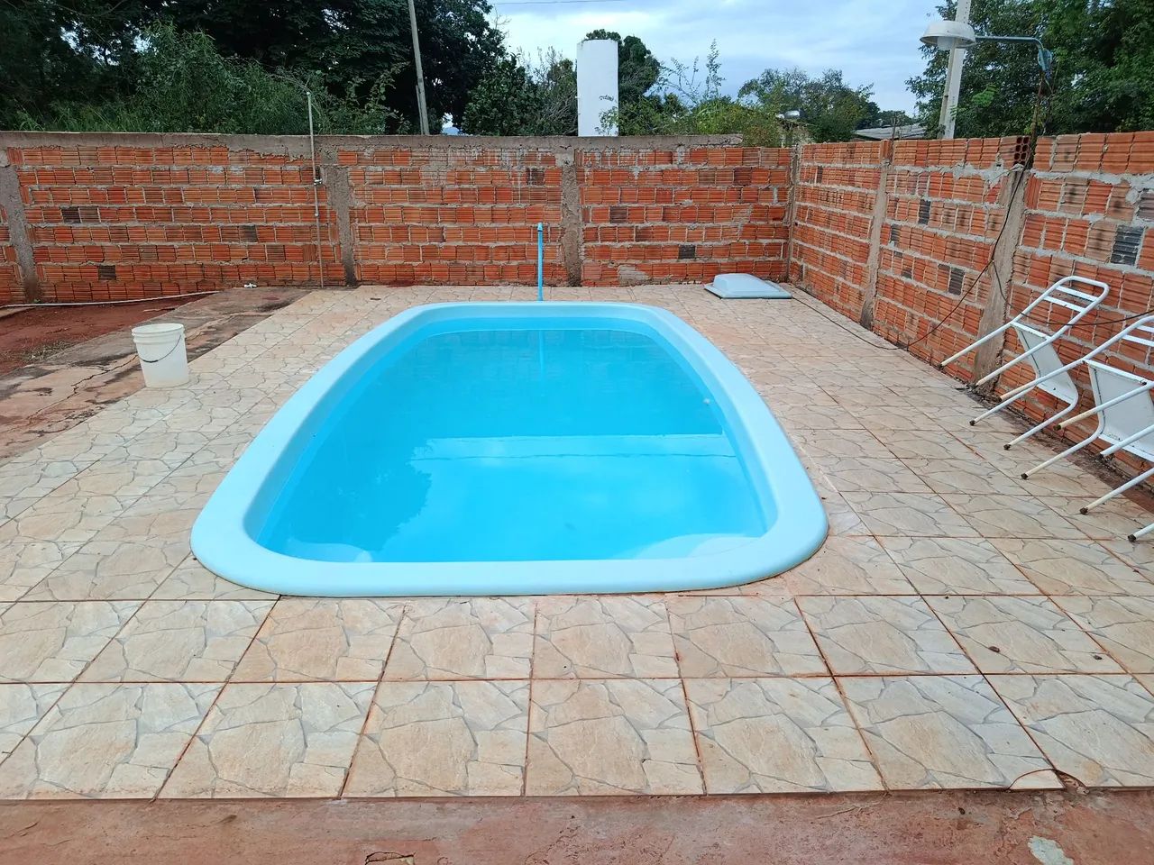 Terreno escriturado com edicula e piscina 
