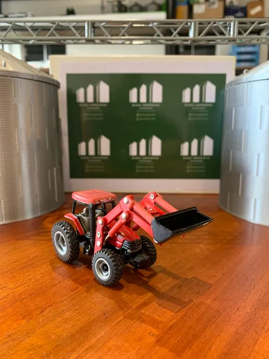 Miniatura trator case IH com lâmina concha 1/64