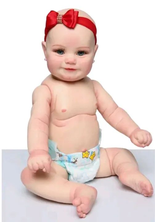 Boneca Reborn Nova 55cm 1.5 kg com acessórios  - Foto 3