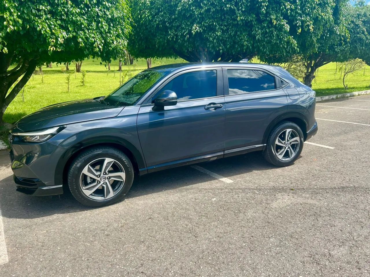 *HR-V Touring 1.5 24/25*<br>Flex <br>Automático <br>Cor: Cinza <br>11 mil km<br><br>*R$ 185.000,00* - Foto 2