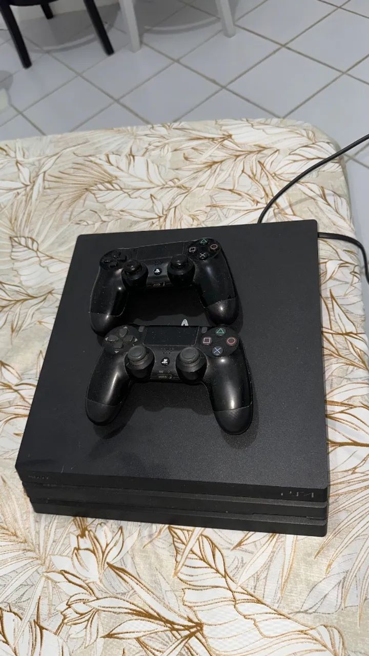 PS4 Pro 1tb + 2 controles + cabos - Foto 2