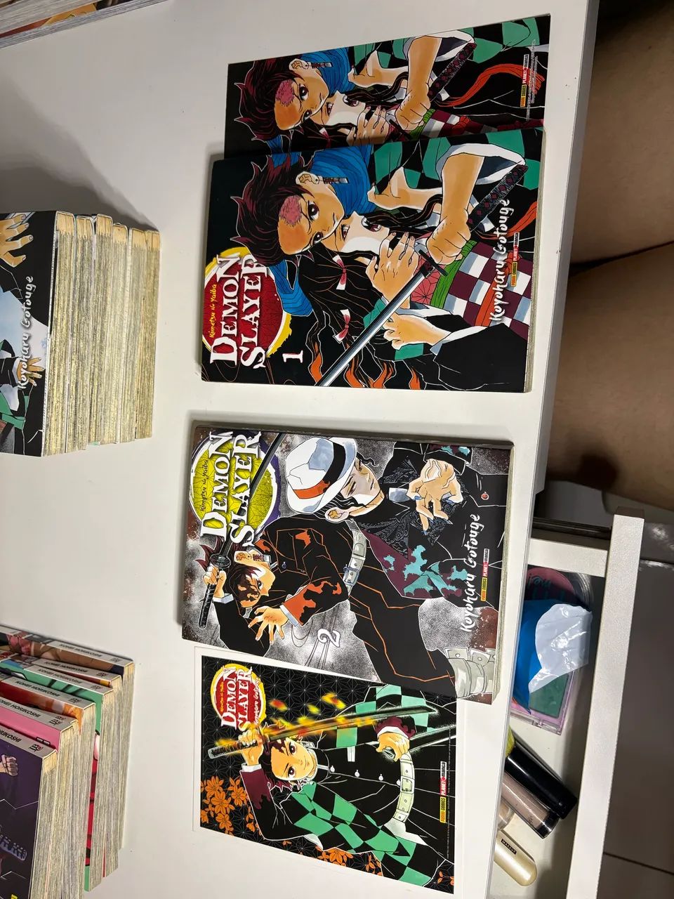 Mangás Demon Slayer volumes 1 a 7, e 9 - Foto 2