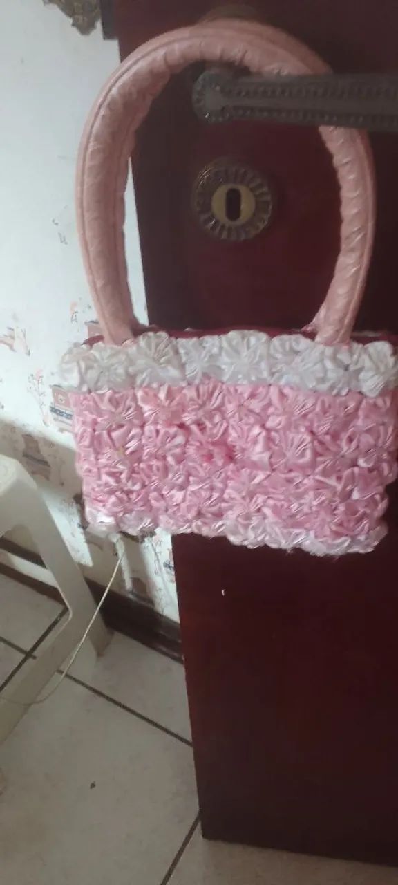 Bolsa de mão rosa de tecido