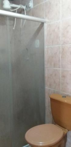 Casa muito ampla e arejada com garagem e 2 qts - Foto 6