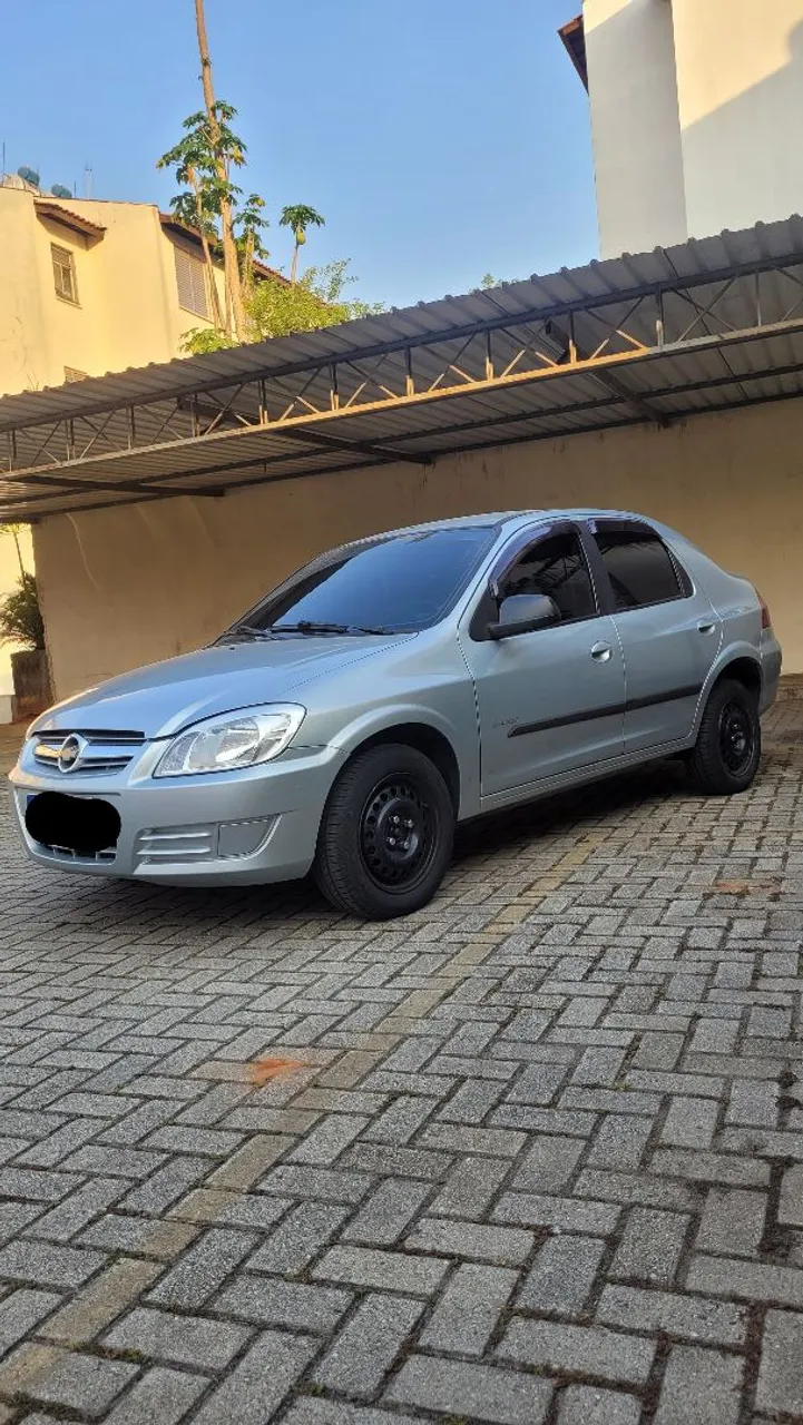 Prisma 2011 1.4 Flex c/ Direção Abaixo da Tabela