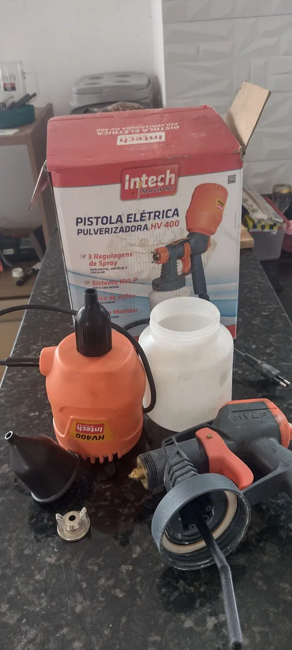 Pistola de pintura para paredes e madeira