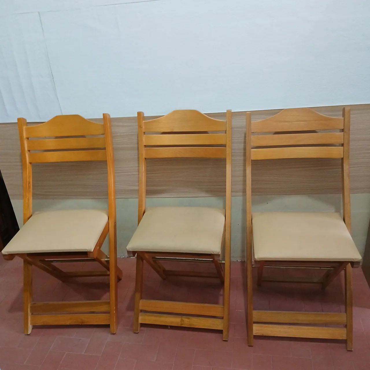 Cadeiras dobráveis estofadas 