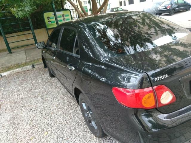 Vendo Corolla xli 1.8 automático - Foto 6