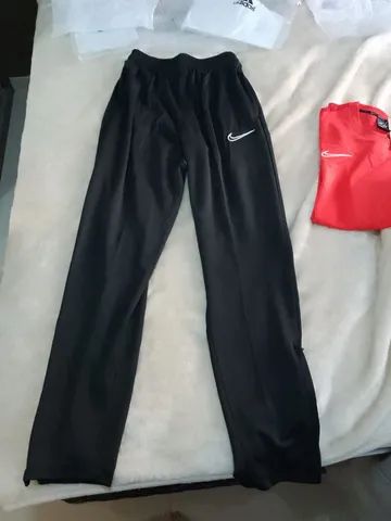 Calça nike com ziper best sale na barra