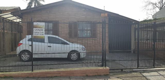 Imóvel c/ 2 casas, 4 dormitórios, Pres. João Goulat-Sta. Maria-10107
