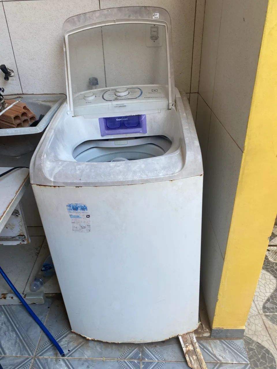 Máquina de lavar com defeito 