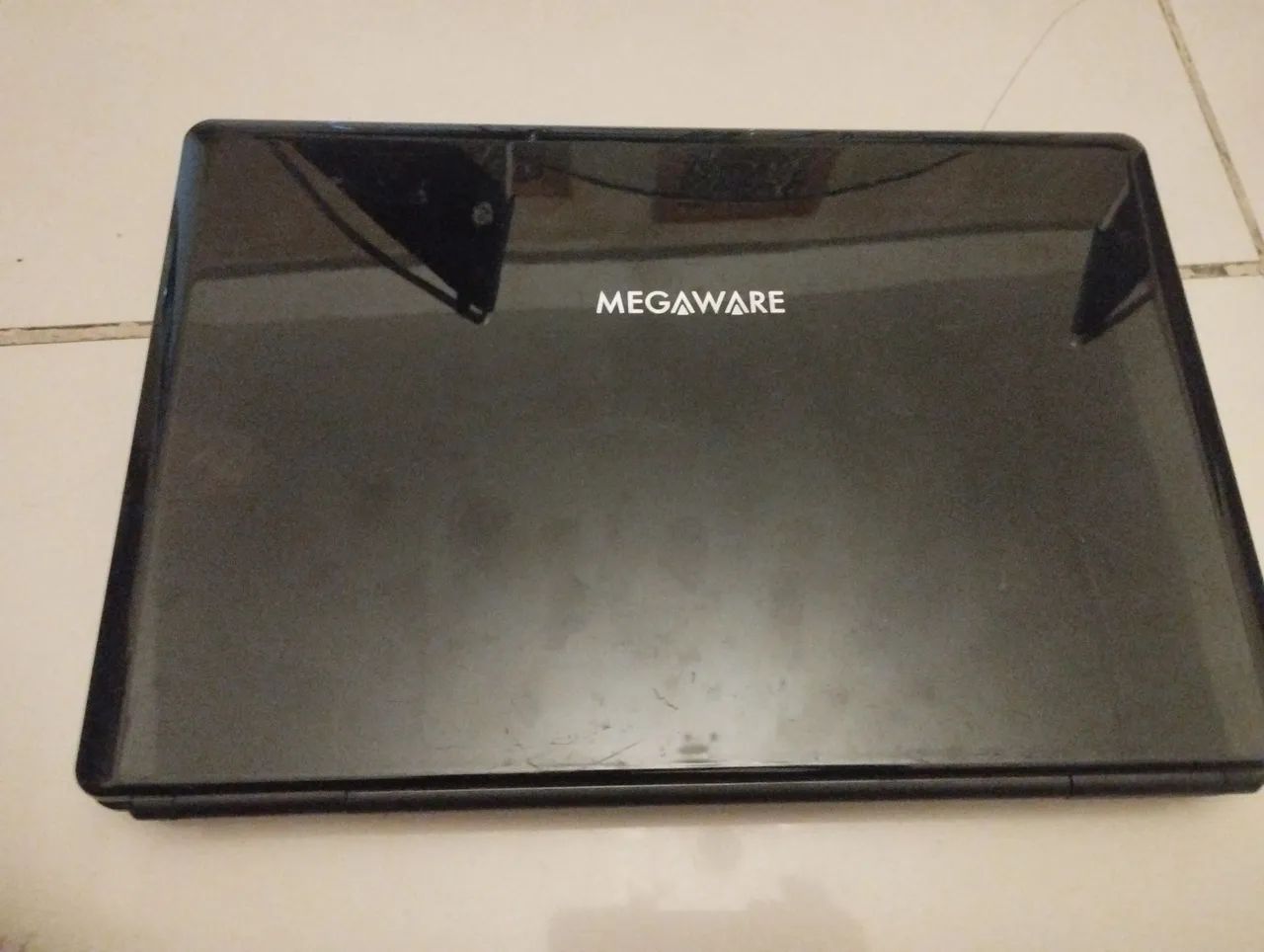 Vendo notebook megaware defeito estado