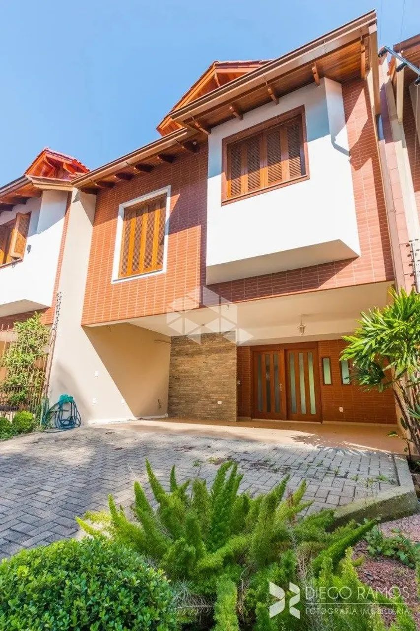Casa com 4 dormitórios a venda no bairro Tristeza - Nova -