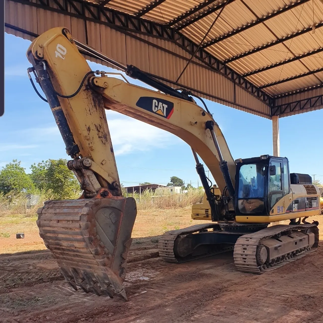 Escavadeira Caterpillar CAT