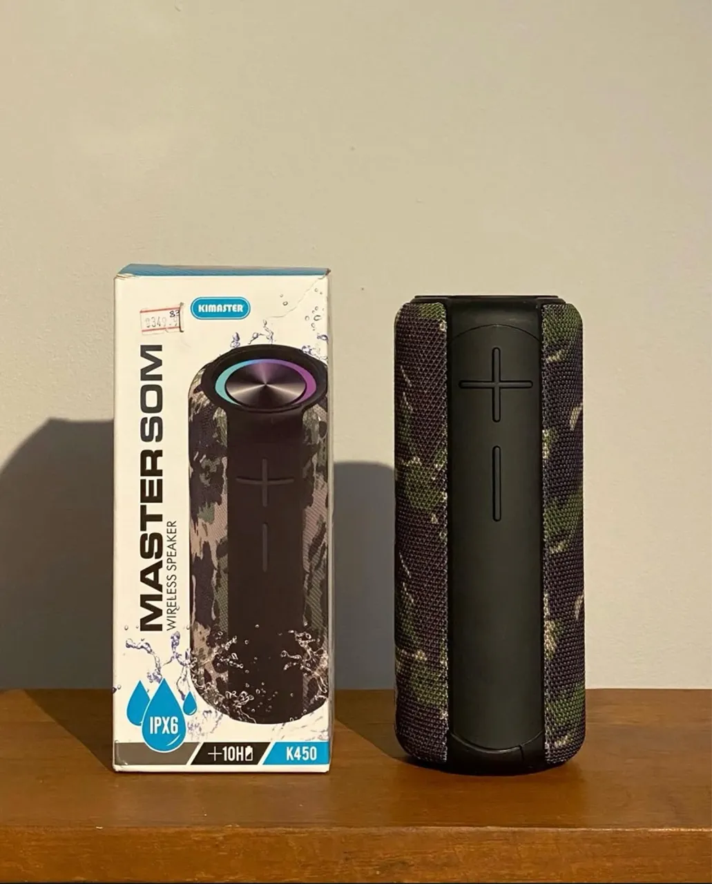 Caixa de Som Bluetooth Kimaster K450 - Impermeável e Potente