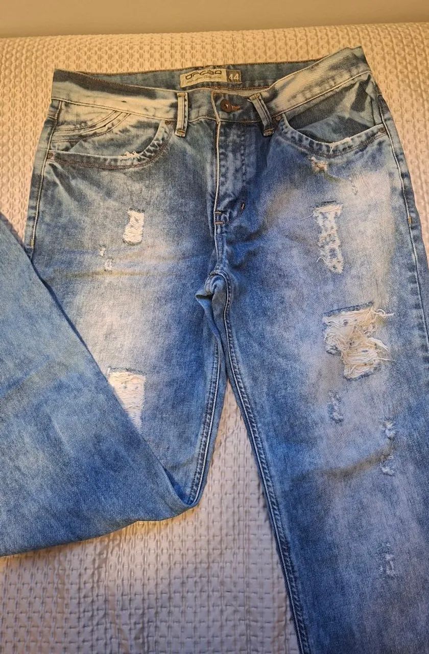 Calça da marca Opção 