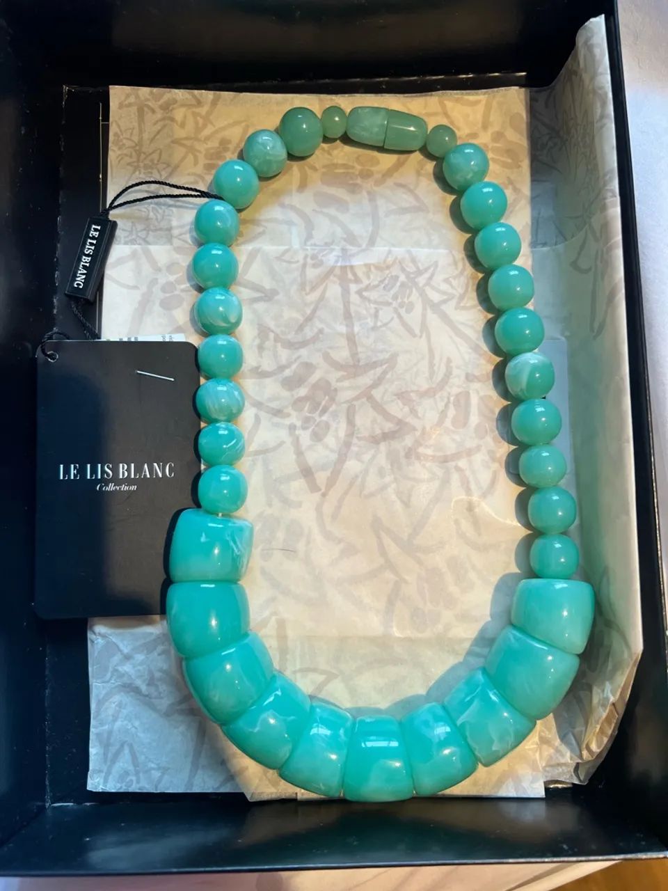 colare le lis blanc azul esverdeado