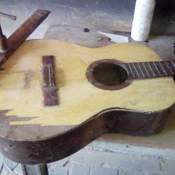 Compro violão quebrado