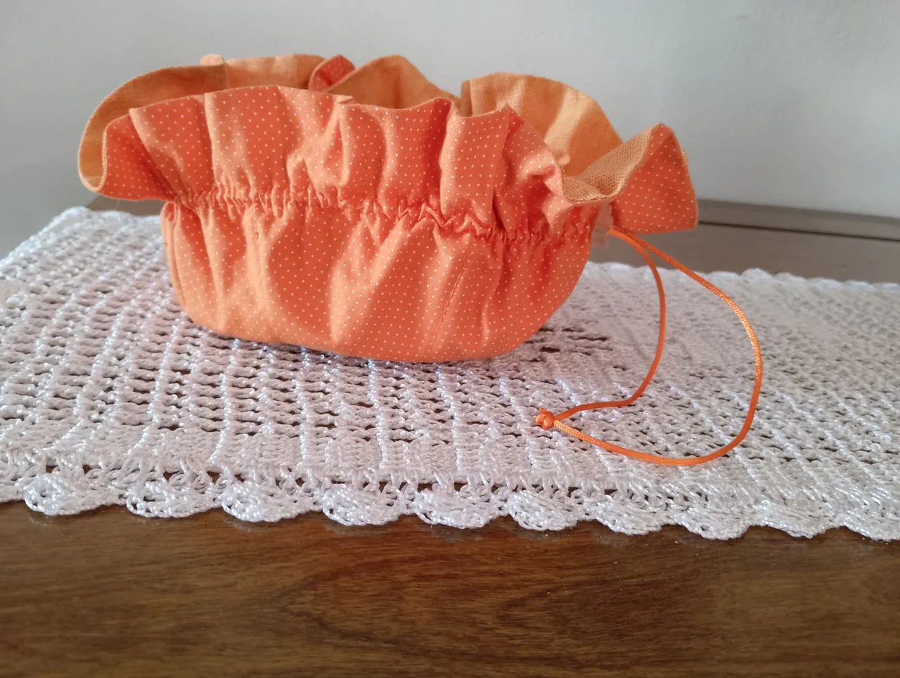 Bolsa porta trecos laranja com bolinhas