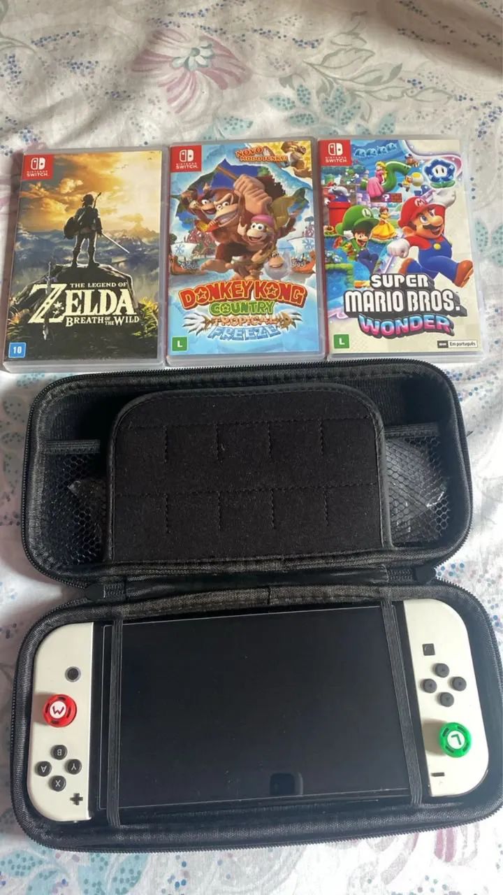 Nintendo Switch OLED 64GB + 3 JOGOS E ACESSÓRIOS - Consoles de