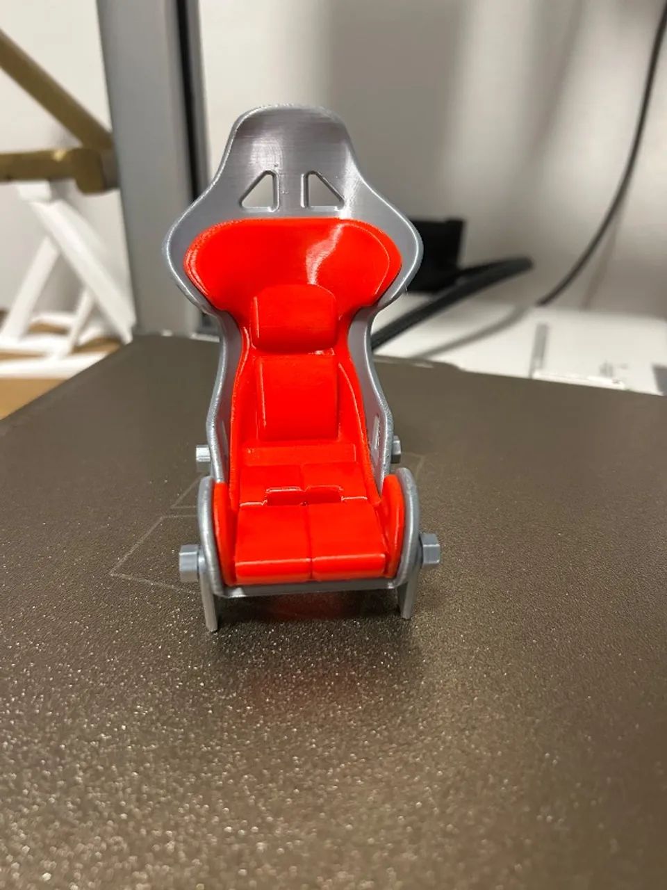 Suporte de celular estilo banco de carro 