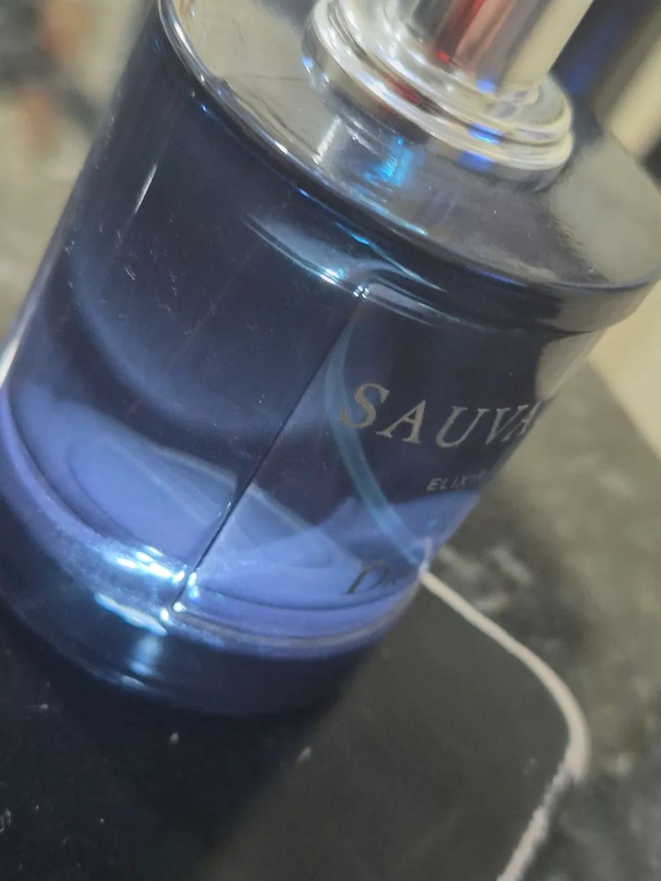 Sauvage Elixir, 60 ML  contém entre 50 a 55 ML do conteúdo  - Foto 5