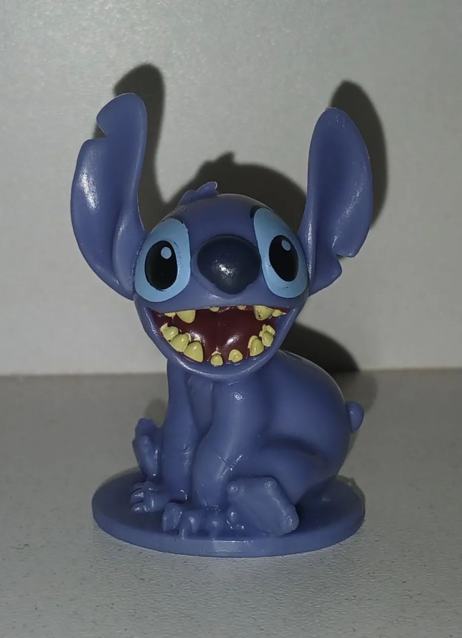 BONECO MINIATURA ORIGINAL LILO E STITCH SENTADINHO