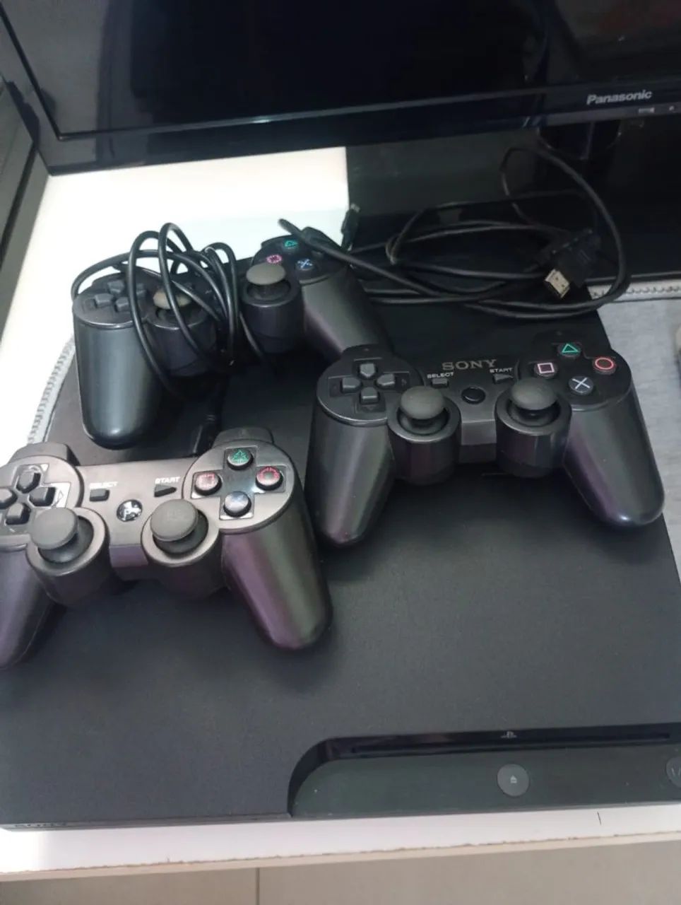 Playstation 3 com 3 controles e dois jogos  - Foto 4