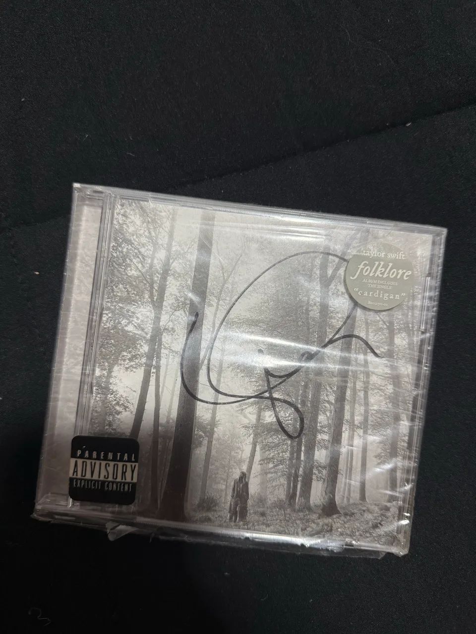 TAYLOR SWIFT FOLKLORE AUTOGRAFADO