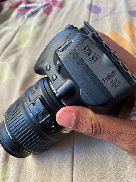 Máquina fotográfica Nikon 