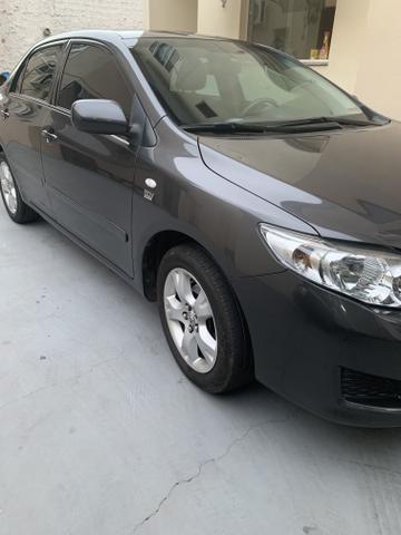 Toyota corolla 2010 1.8 GLI flex 4p manual - Foto 4