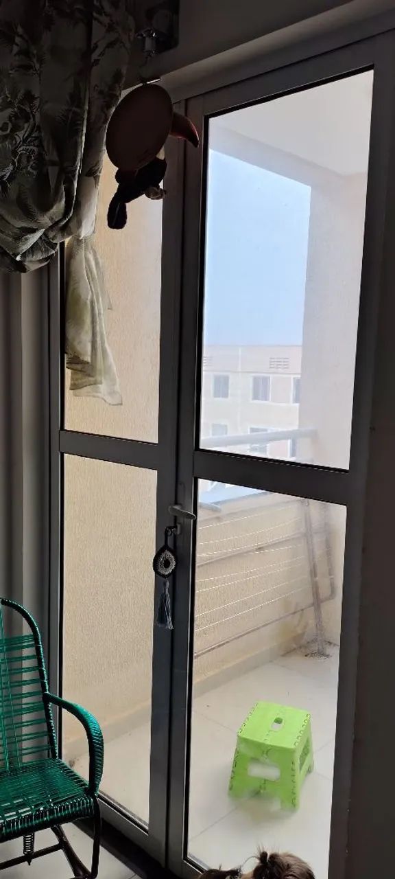 Vendo porta de alumínio duas folhas.500