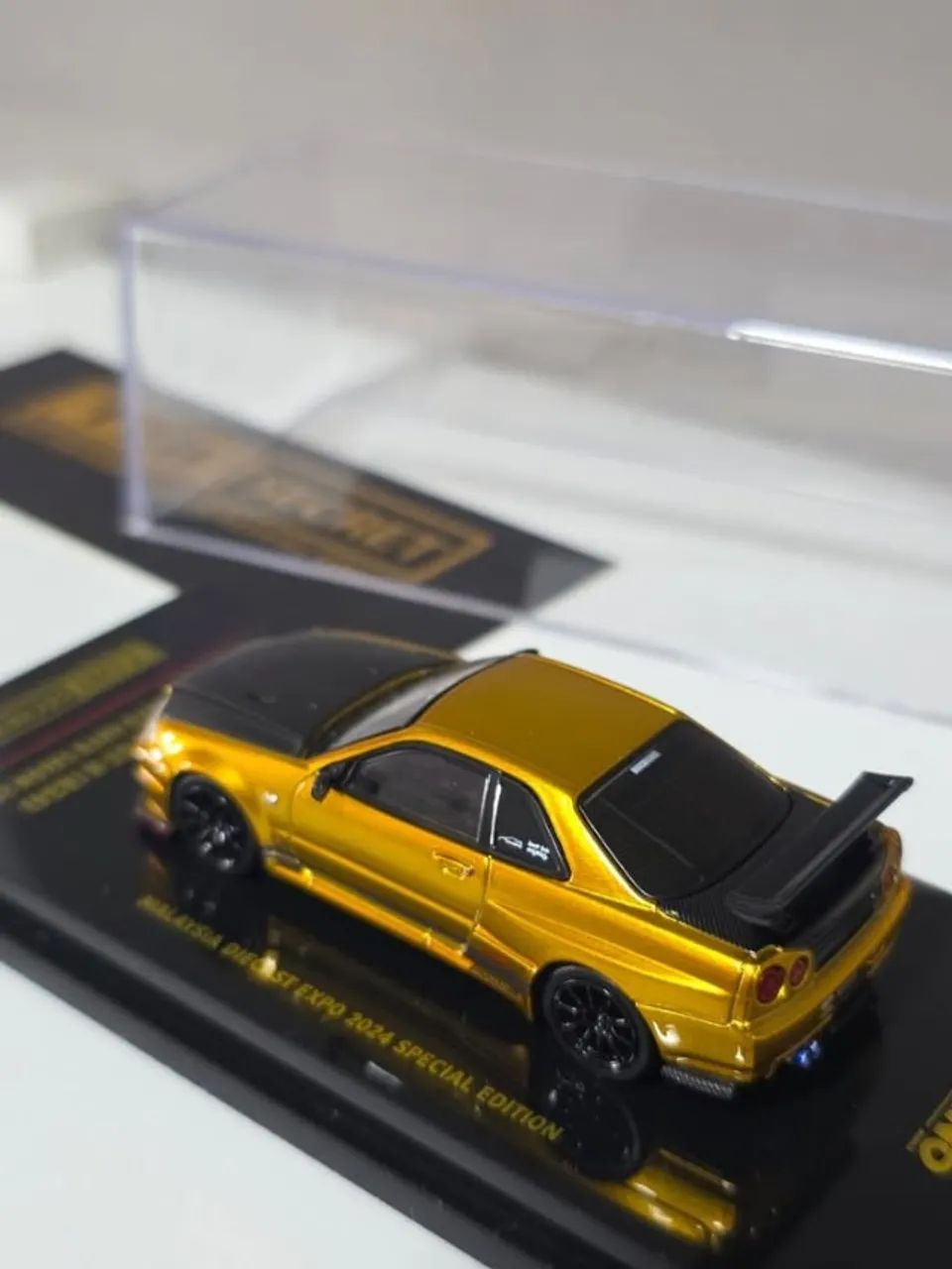 Nissan Skyline GT-R R34 Dourado - Inno64 x Top Secret Malaysia