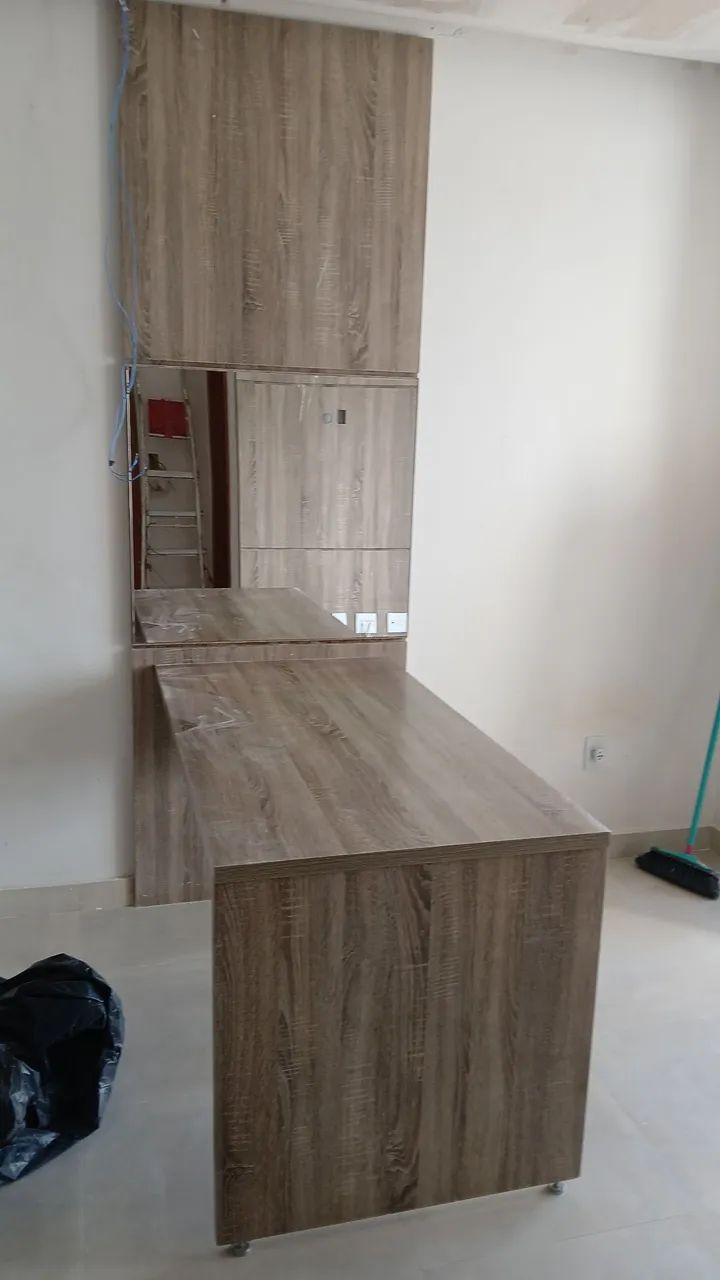 Panel with attached table and panel plus low cabinet with 03 drawers.64311791014531123