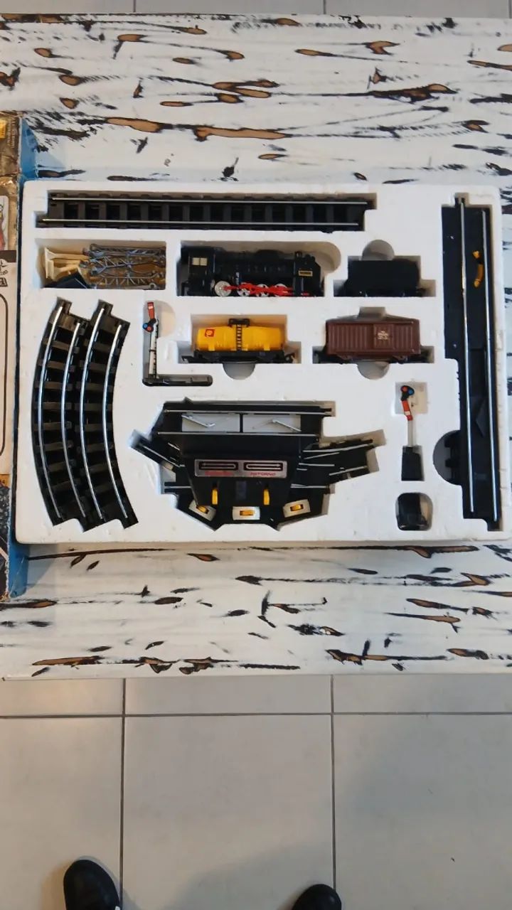 Ferrorama XP 1300 funcionando, na caixa com manual