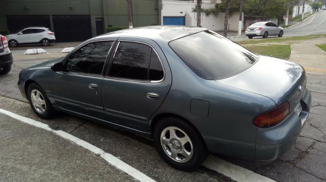 Nissan Altima 1993 2.4 16v - Foto 9