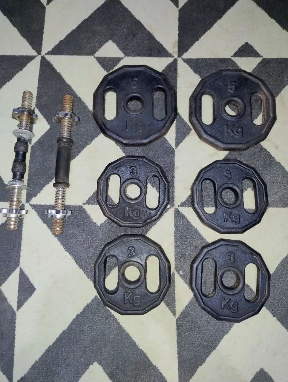 Kit de Musculação (halteres + anilhas)