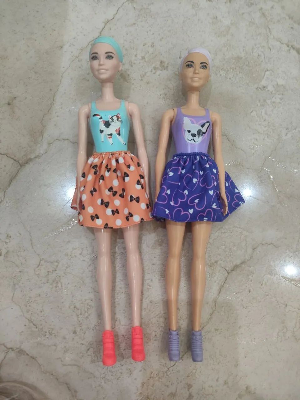 Duas Barbies, 50,00!