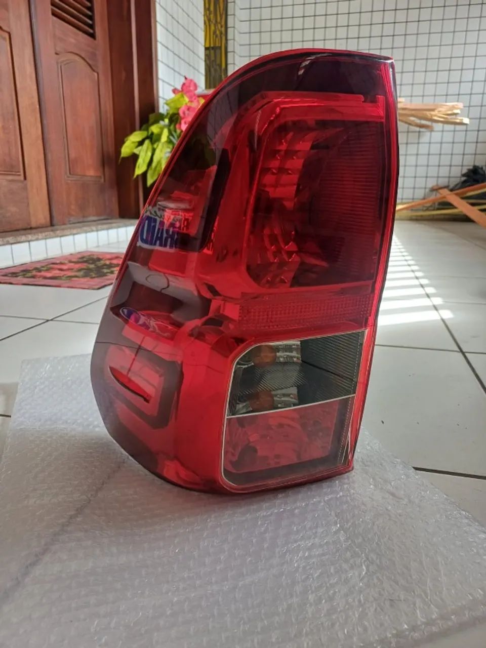 Lanterna esquerda da Hilux 2019