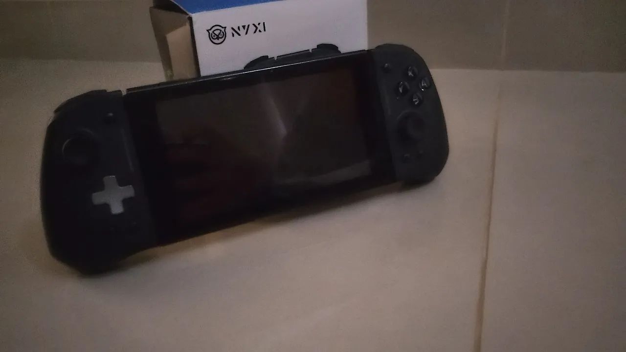 Kit Nintendo switch + jogos e controles - Foto 2
