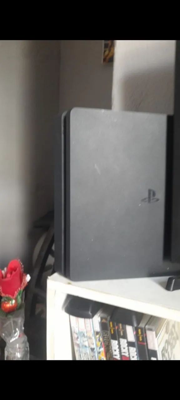 Ps4 slim  troco em ps3 super slim com 700 0 de volta