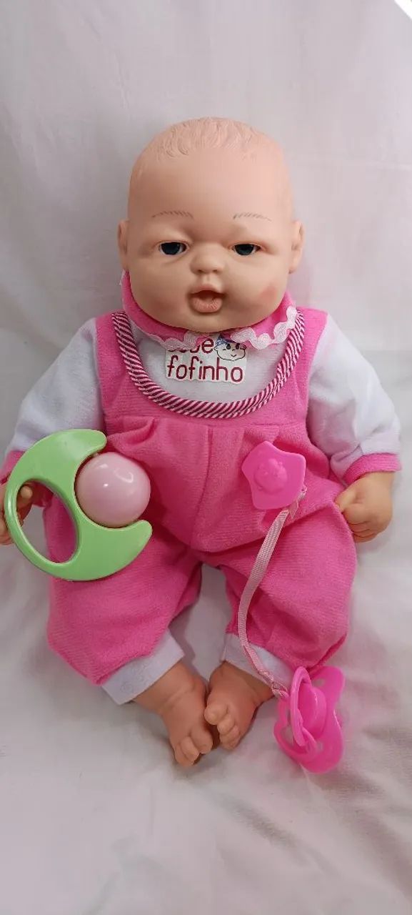 Boneca que chora ,sorri e dorme ,com chupeta e mamadeira com imã, completa  - Foto 4