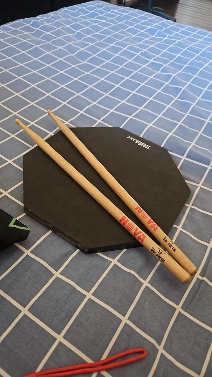 Pad Pro Fire + Baquetas Nova 5A