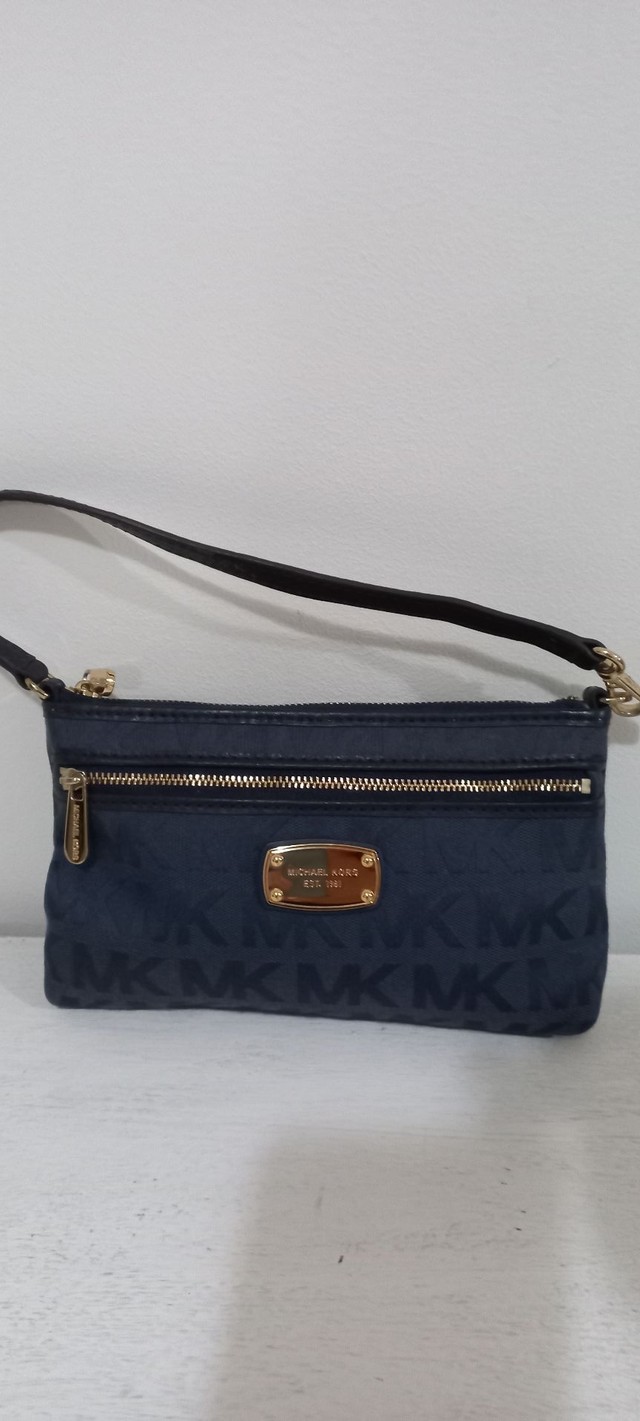 bolsa clutch michael kors