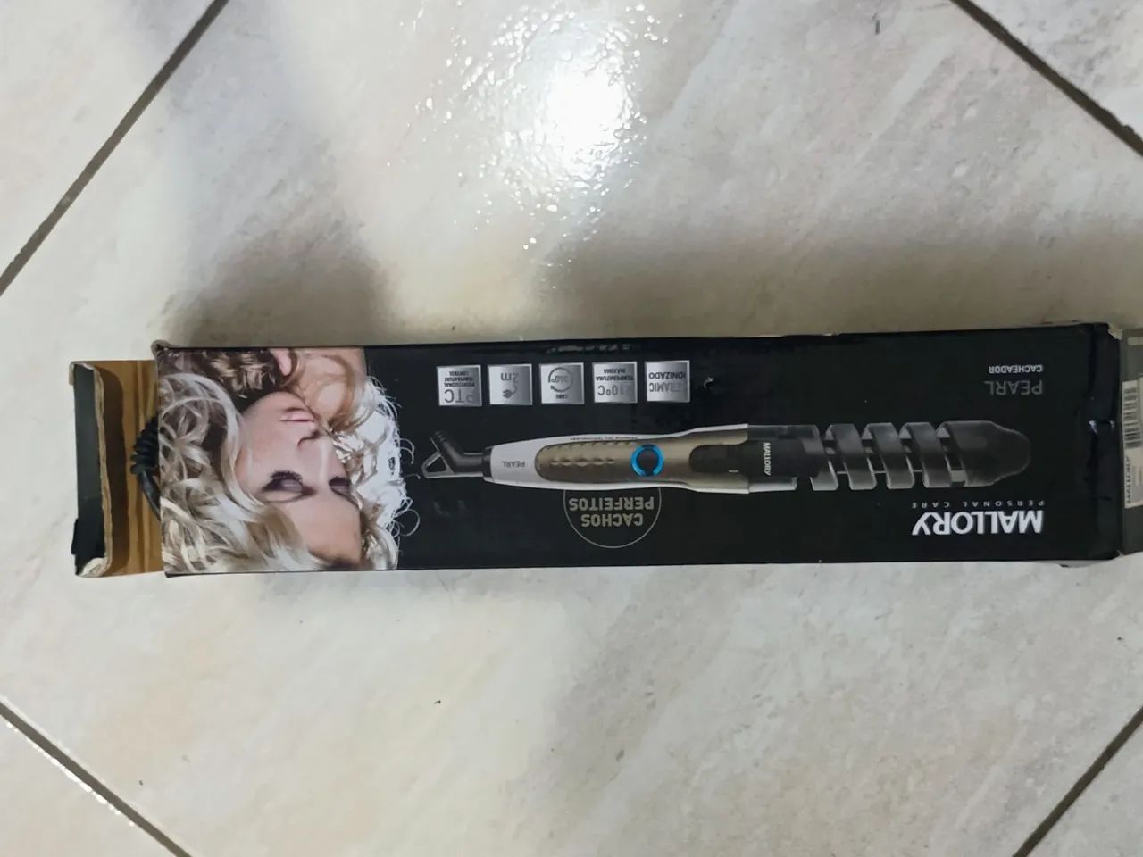Vendo escova modeladora de cachos 