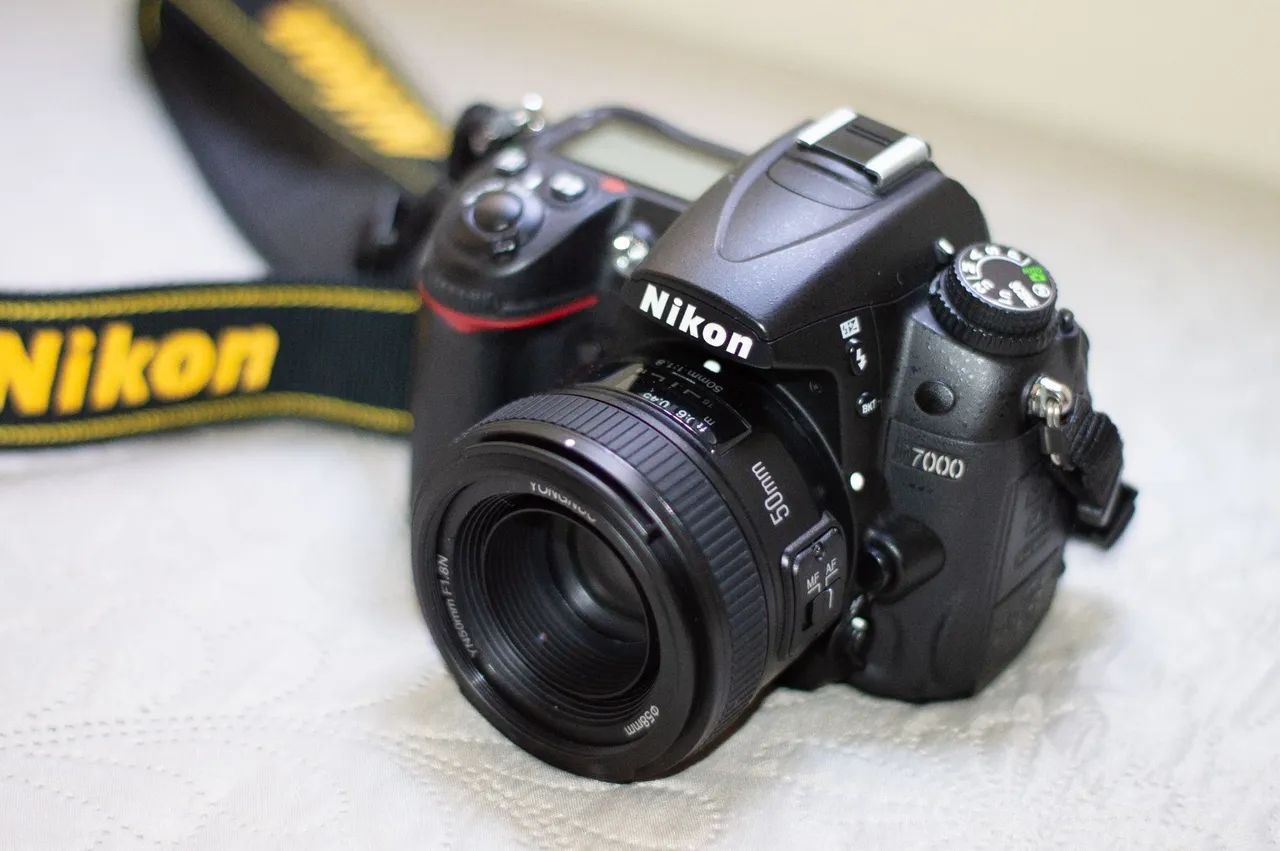 Nikon D7000 + Lente 50mm Extremamente bem cuidada