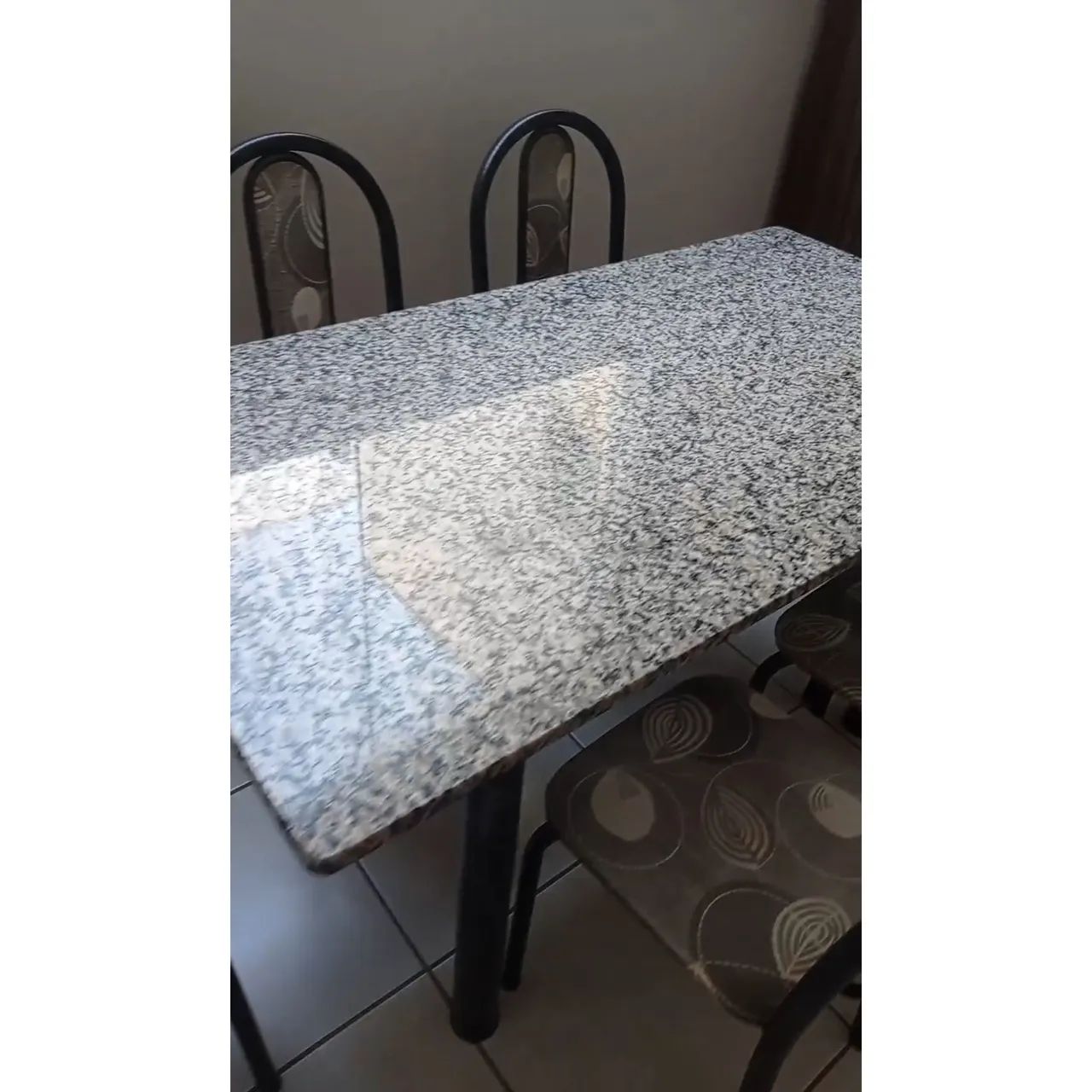 Granite-top table with 6 chairs65579525962754121