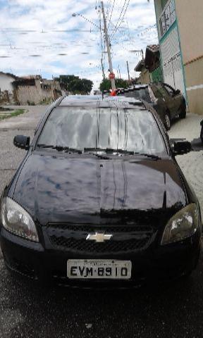 Carro Celta com quatro portas, vidro elétrico e direção hidráulica - Foto 4
