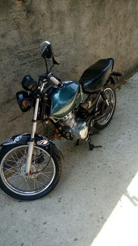 VENDO TITAN CG 125 OU TROCO EM FALCON OU XRE COM VOLTA MINHA